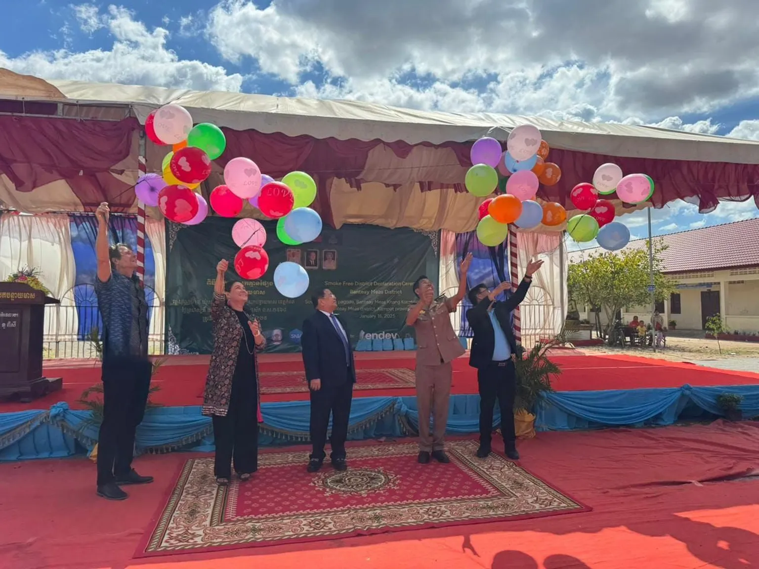 People holding balloons