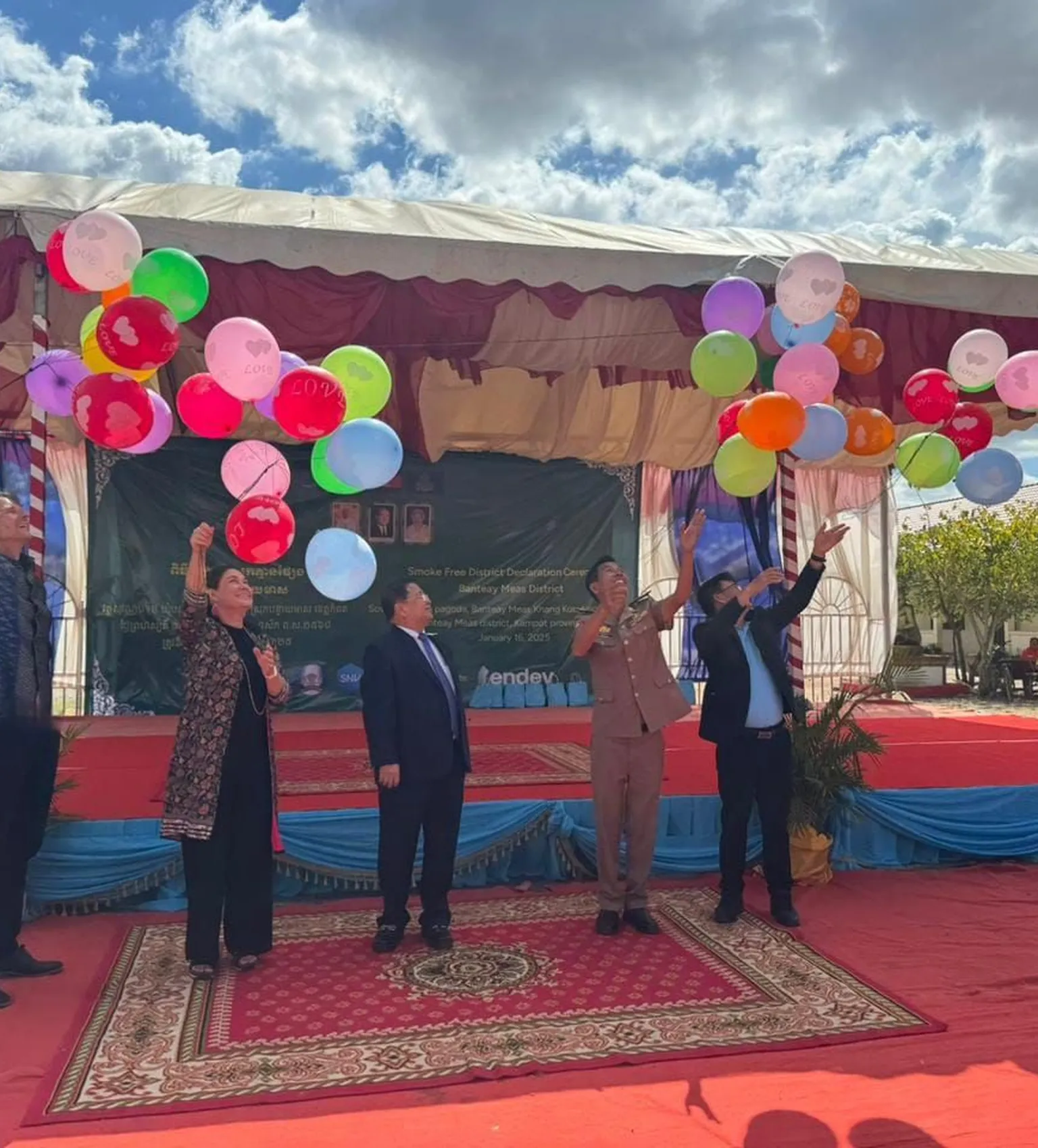 People holding balloons