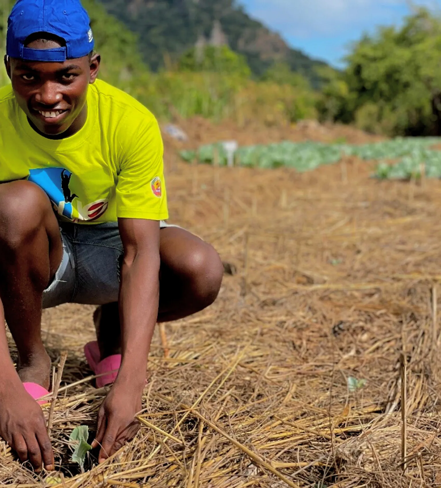 A photo of Augusto Agostinho in an agricultural field