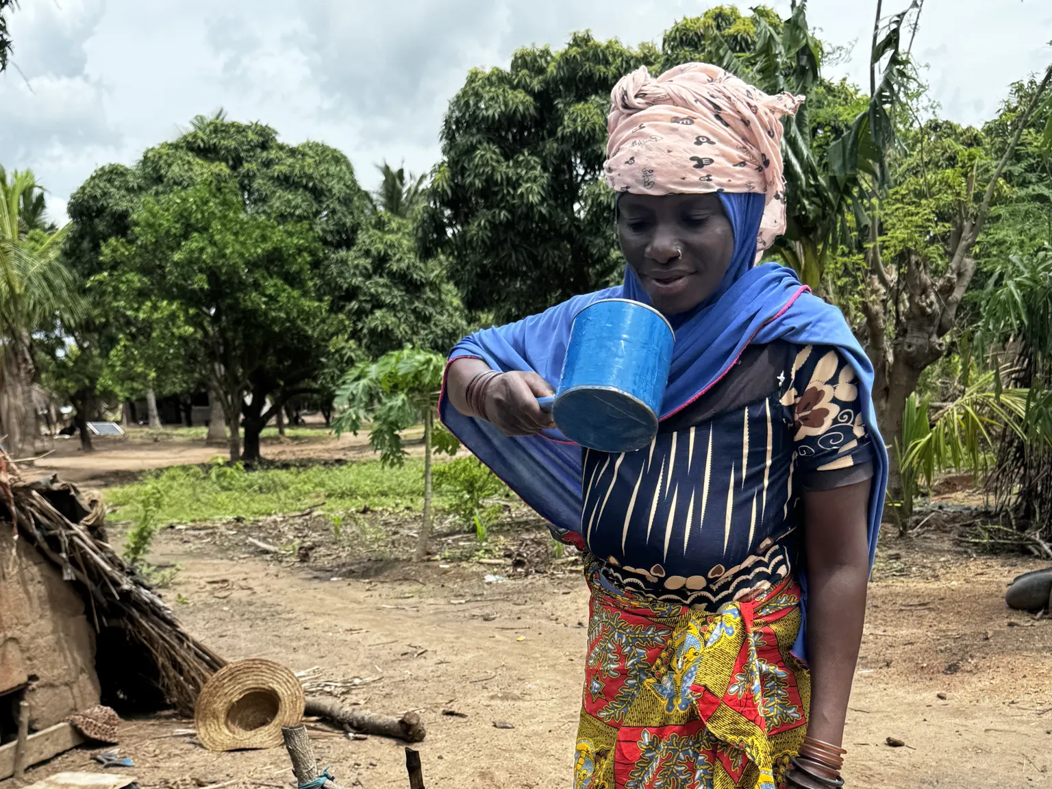 Mozambican woman and her newly installed tap