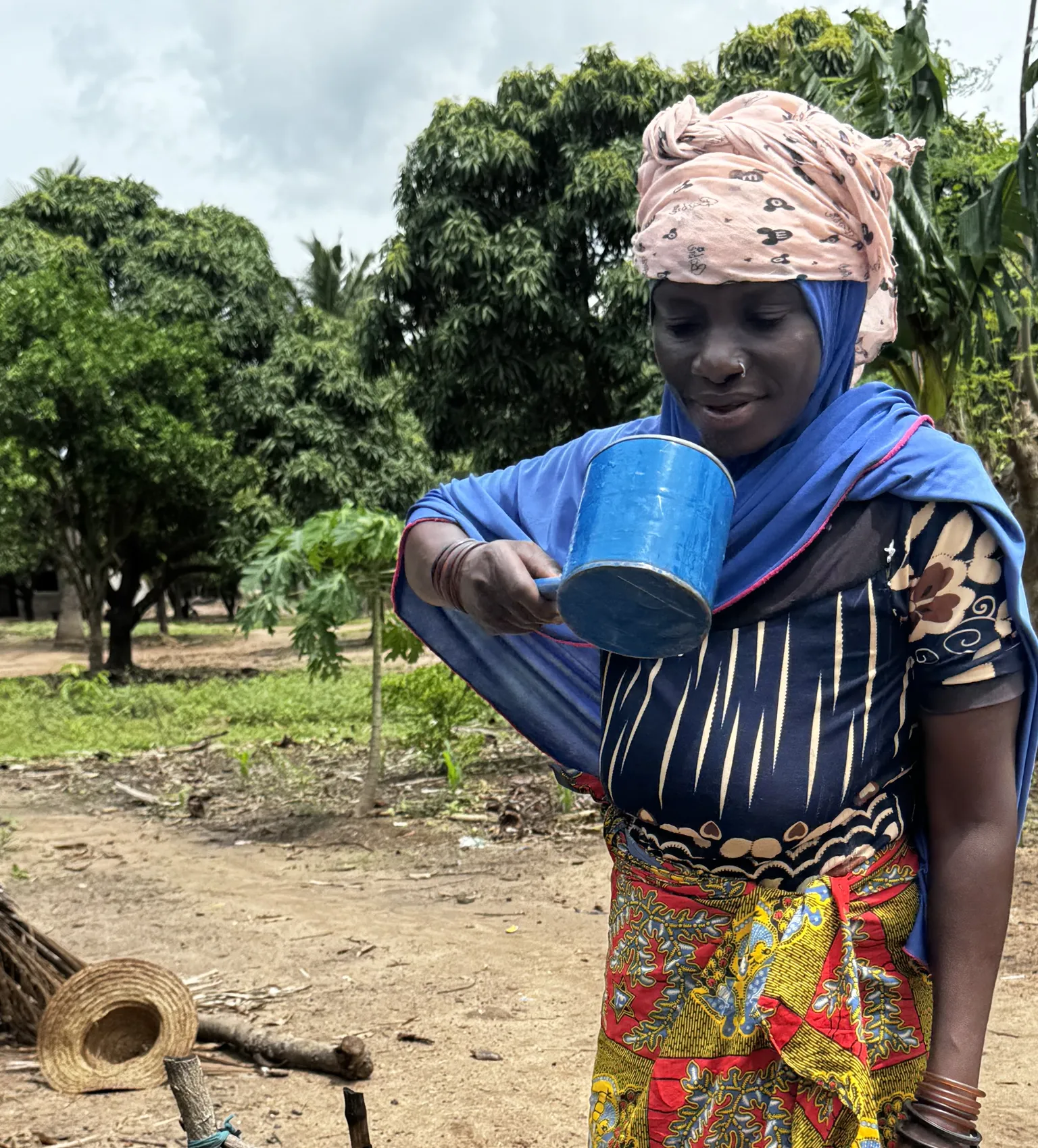 Mozambican woman and her newly installed tap