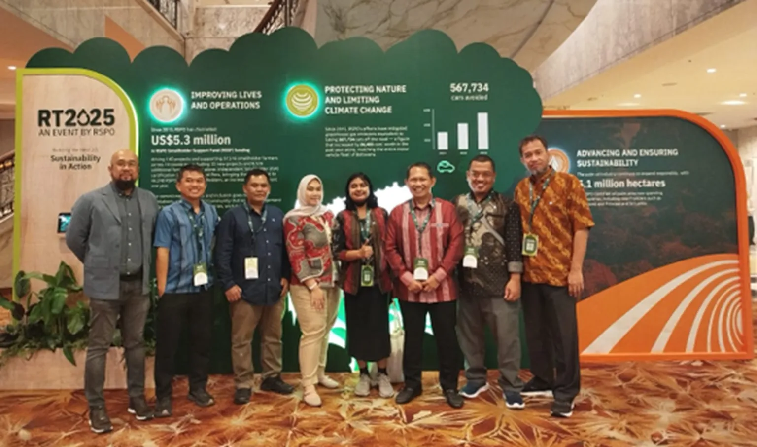 SNV representatives at the RSPO RT2025 conference booth in Kuala Lumpur.