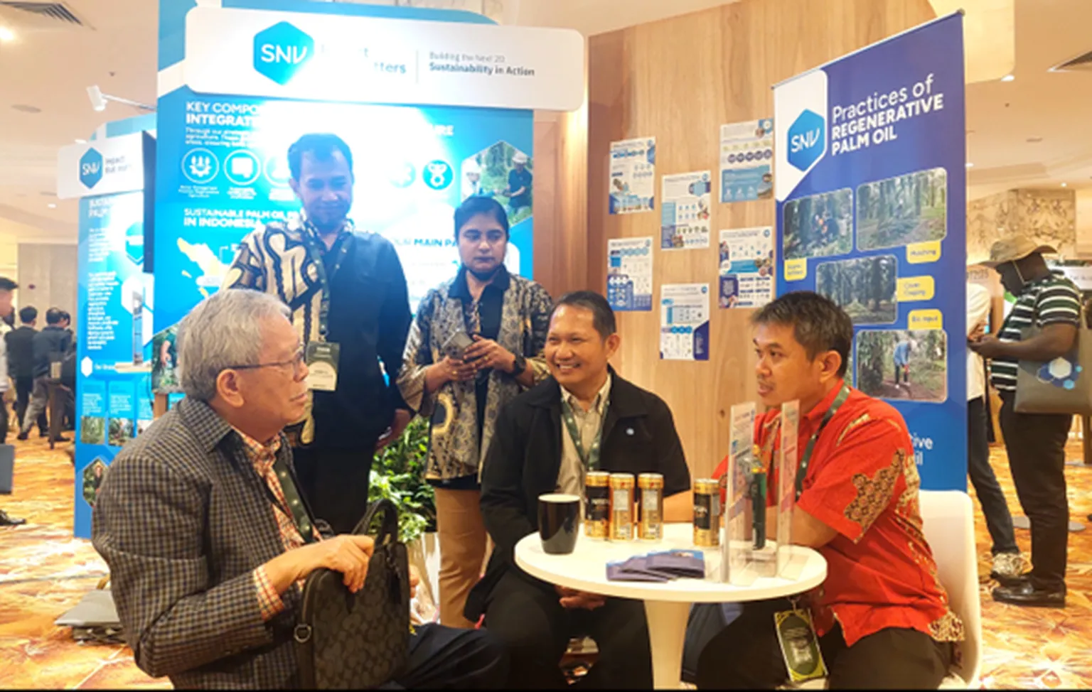 SNV team in discussion with Prof. Dr. Bungaran Saragih about regenerative palm oil in Indonesia.