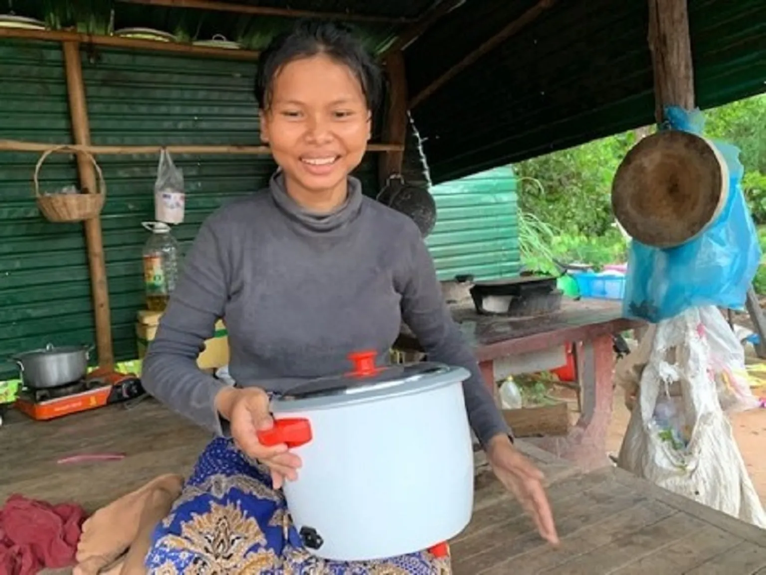 She is now using electric rice cooker to cook rice and LPG to cook food