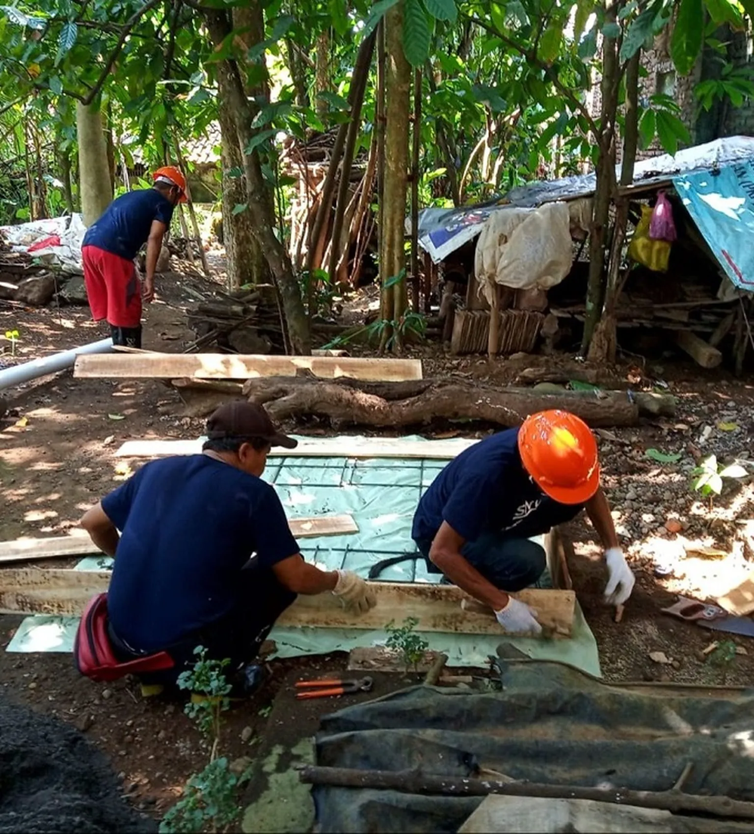 Masons in Indonesia during an SNV-led practical workshop on septic tank installation